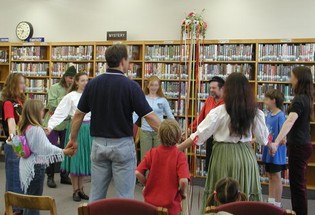 Learning a folk dance at a library
