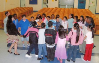 Students learning a folk dance
